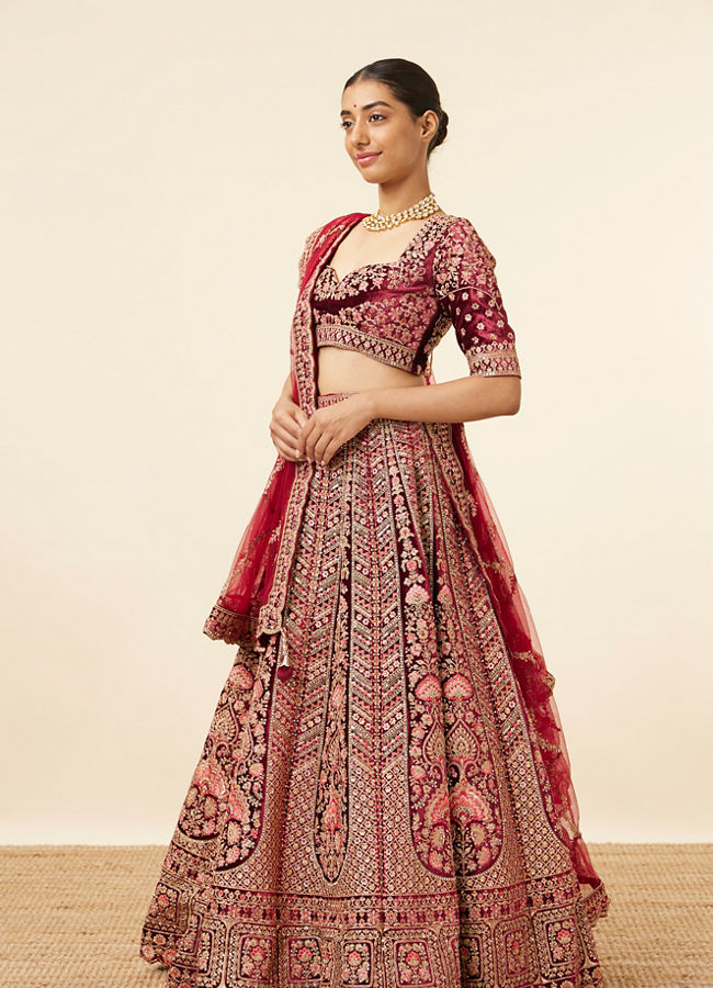 alt message - Mohey Women Maroon Embellished Bridal Lehenga image number 2